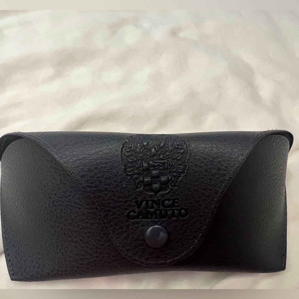 Vince Camuto sunglasses case.